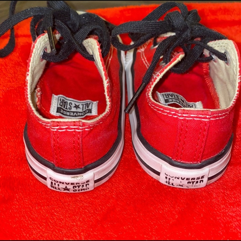 8C Red Chuck Taylors (converse)